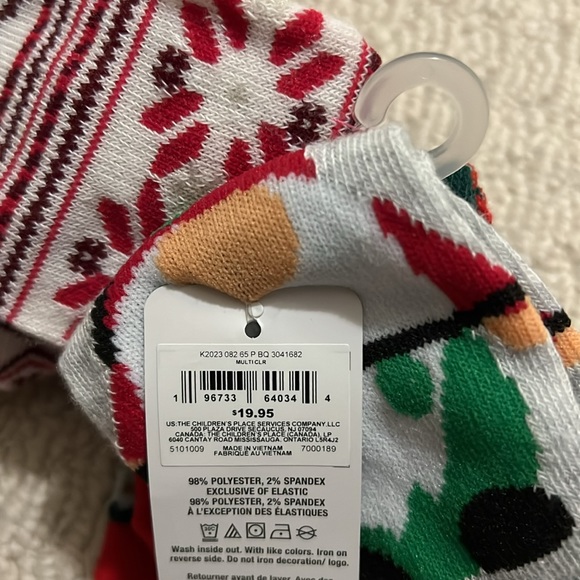 NWT - 3 pairs of socks with grips on bottom. Size 12-24 months. - Picture 7 of 7